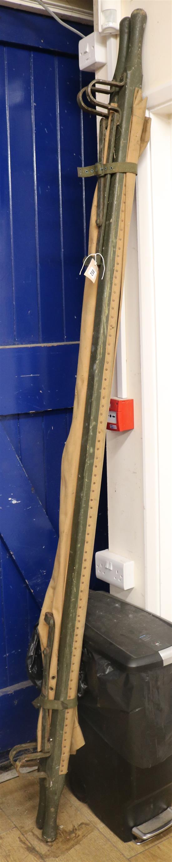 A military folding stretcher W.228cm